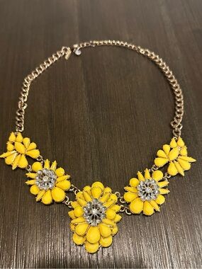 Natasha necklace features yellow floral accents with clear crystal centers